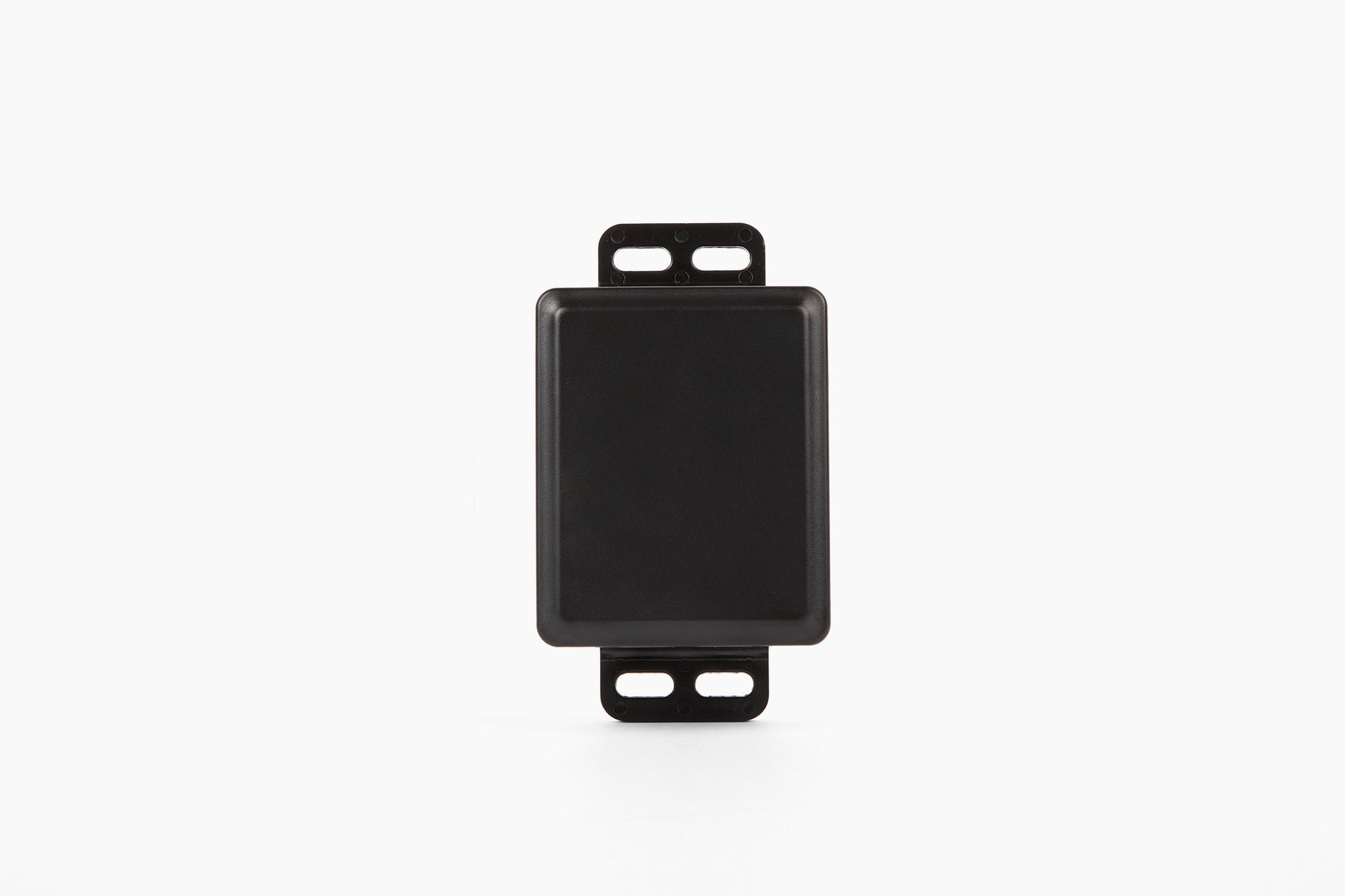 AssetTrack Mini GPS tracker with a 5-year battery life, designed for tracking construction equipment like trailers, skid steers, and tools. Features magnetic mounting, global coverage, and a rugged, weatherproof (IP67) design.