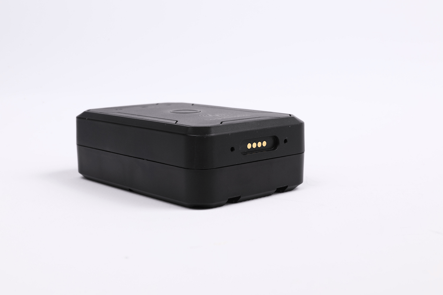Black GPS tracker on a white background