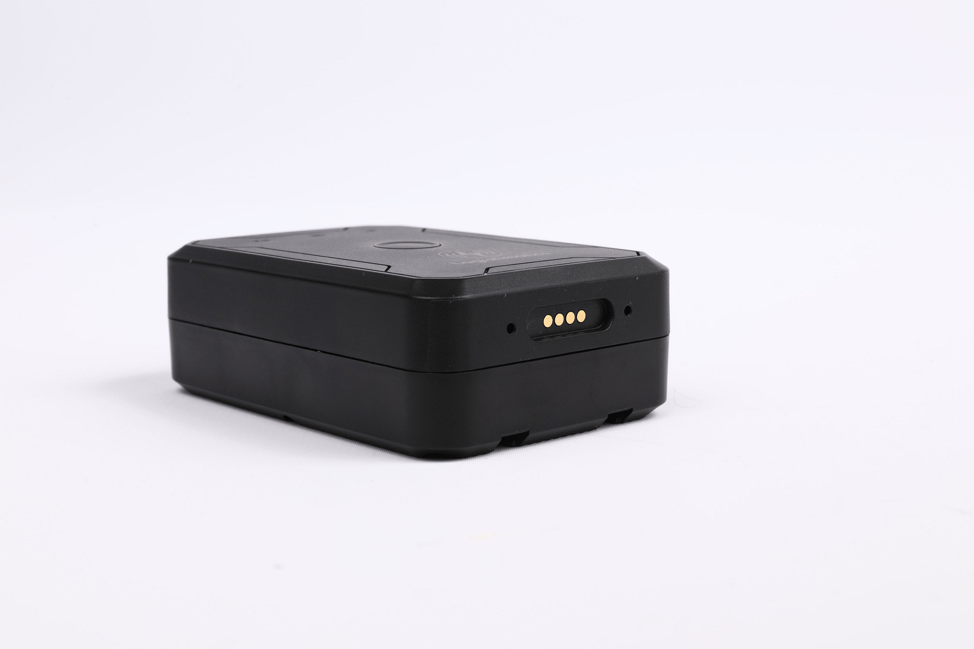 Black GPS tracker on a white background