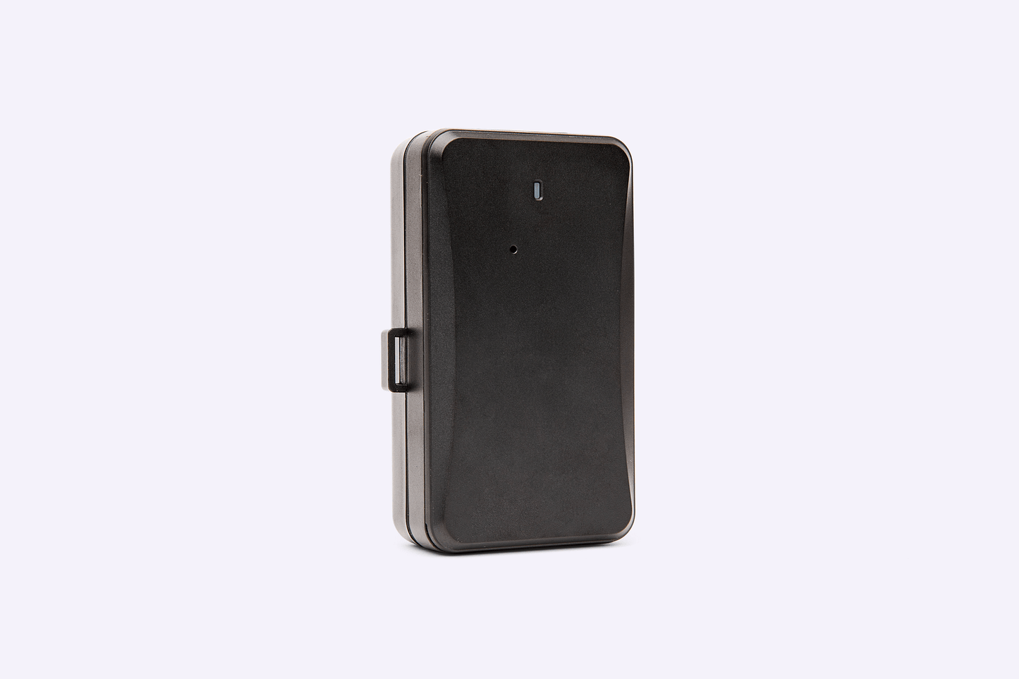 Compact black GPS tracking device with durable casing, shown standing upright on a light background.