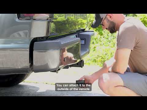 Video featuring a man demonstrating the straightforward attachment of a Logistimatics Mobile-200 tracker to a vehicle's exterior, highlighting the ease of use for concealed tracking and enhanced security.